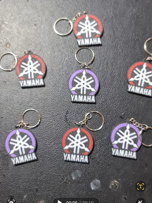 Yamaha keychain with red and purple logo