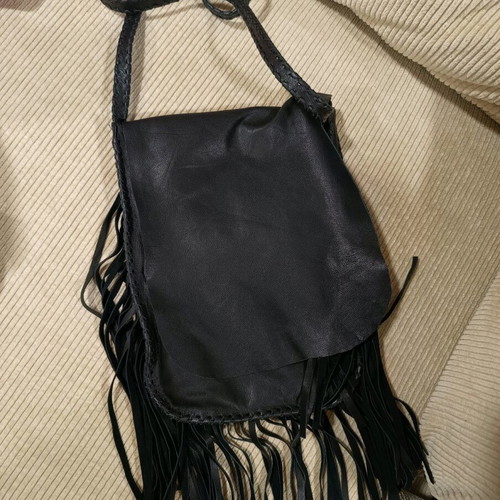 Women's leather crossbody bag with fringes nearly unused black