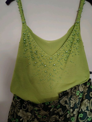 Knitted top used green lime with green pearls, size S