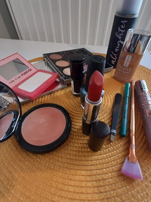 Set of used cosmetics with new Maybeline Sky High mascara