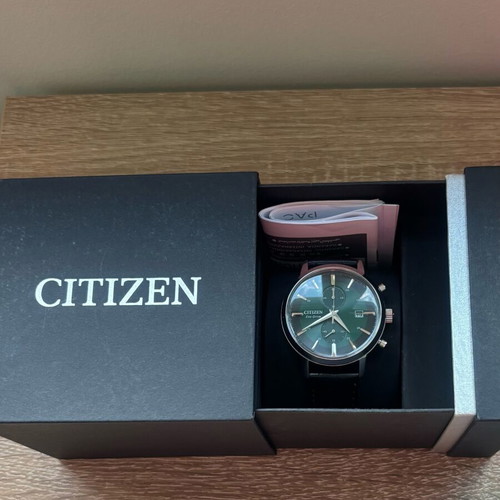 Citizen Eco Drive CA7069-24X watch like new, green dial, leather strap