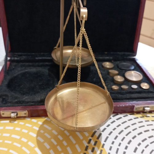 Vintage brass precision scale in wooden case with velvet lining and weights