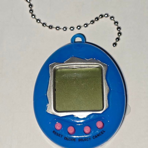 Electronic Digital Retro Virtual Pet Game like new