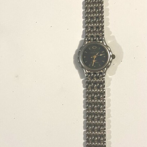 Charles Delon women's waterproof watch used, gold color