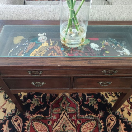 Vintage carved wooden console with three drawers