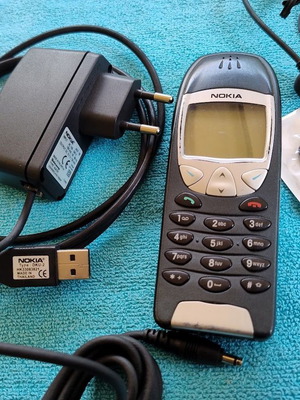 Nokia 6210 mobile phone used with new battery, USB cable and wired headset