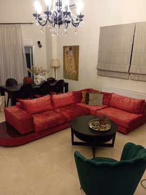 Corner sofa 2.90x2.00 m with green velvet armchair, red