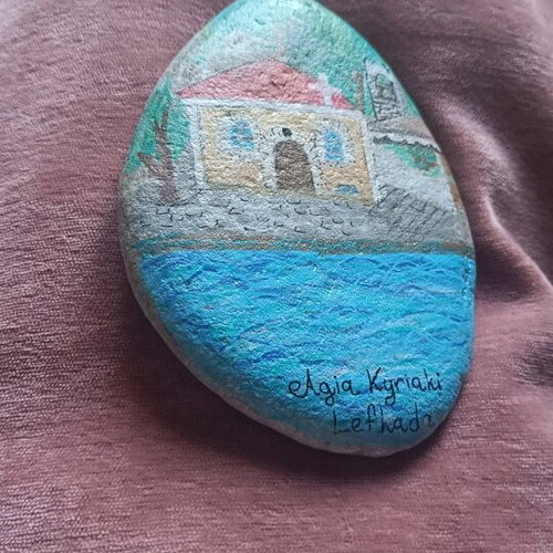 Painted stone new with image of Lefkada landmark