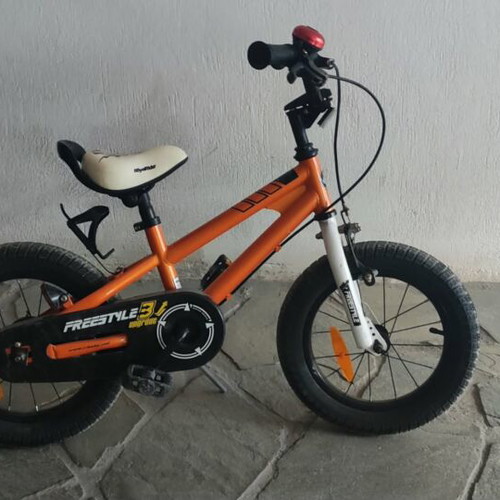 Freestyle kids bicycle like new, orange BMX with V-Brakes