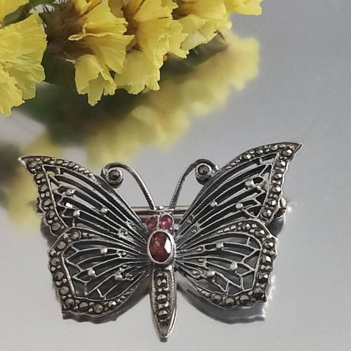 Vintage Atelier silver butterfly brooch used with red stones and marcasites