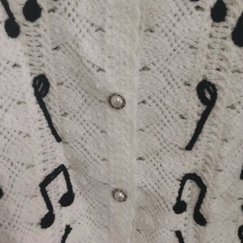 White Shein cardigan like new with embroidered black notes and pearl buttons