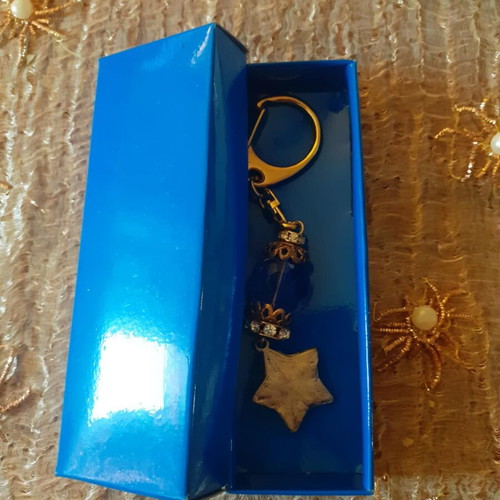 Keychain new with star charm and blue stone