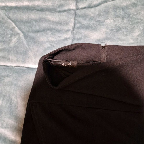 On Line fitted black skirt size S like new, elastic