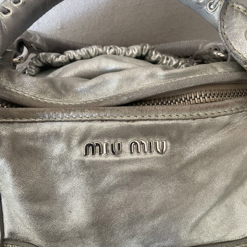 Miu Miu Vintage Bag used, metallic silver leather with perforated design