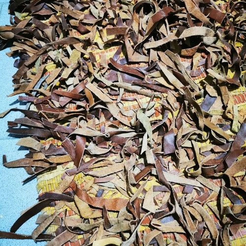 Leather flokati rug like new, brown shades, 138cm x 64cm