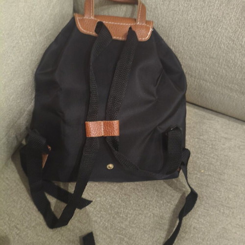 Foldable backpack like new, black with brown details