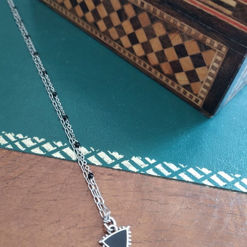 Stainless steel necklace with black details