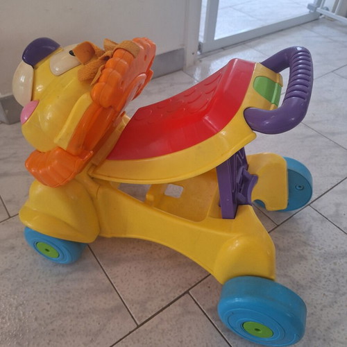 Fisher Price Walker & Ride-On Lion toy used with lights and sounds