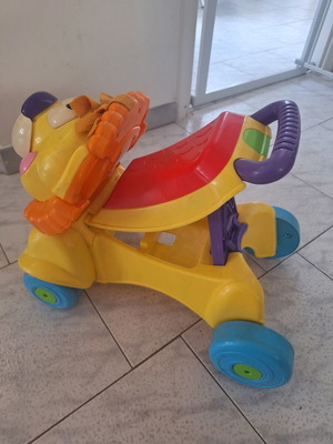 Fisher Price Walker & Ride-On Lion toy used with lights and sounds