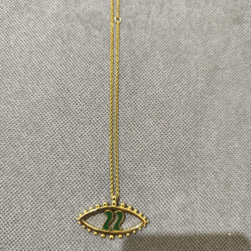 Pendant charm 2022 gold color, like new, green detail