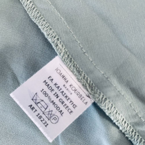 Ioanna Kourbela wrap blouse new, size S, aqua color with stain