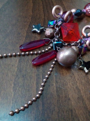 Alternative long necklace with red beads used