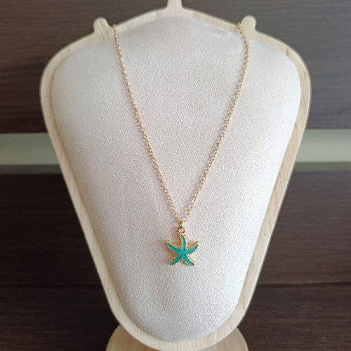 Starfish necklace in stainless steel, like new, gold color