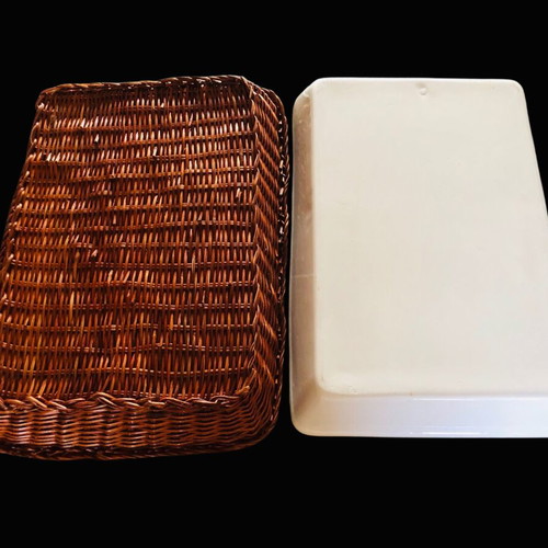 Rectangular Pyrex used with blue flowers and wicker base