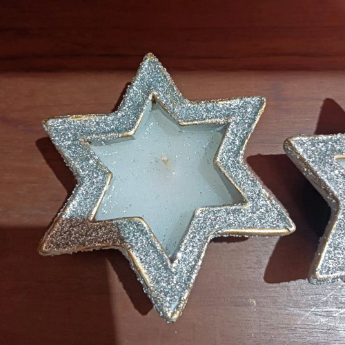 Christmas candles in clay stars with silver glitter new
