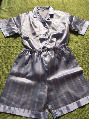 Blue satin summer pajama set with vertical stripes, shirt and shorts