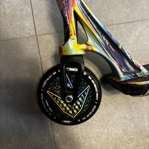 Scouter Envy scooter used with new handles, wheels, and grip tape