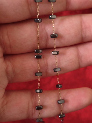 Minimalist choker necklace with gold-plated steel and natural hematite, like new