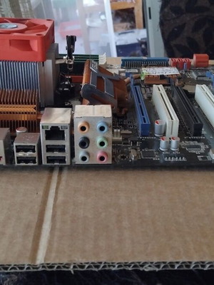 Asus M4A79T Deluxe motherboard used with CPU, fan and 16GB RAM