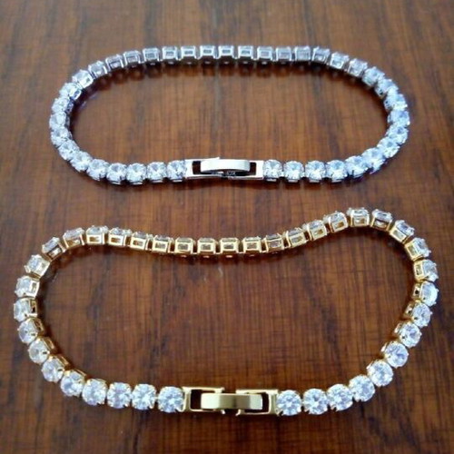 Riviera bracelet new, gold and silver with zircon stones, 18cm