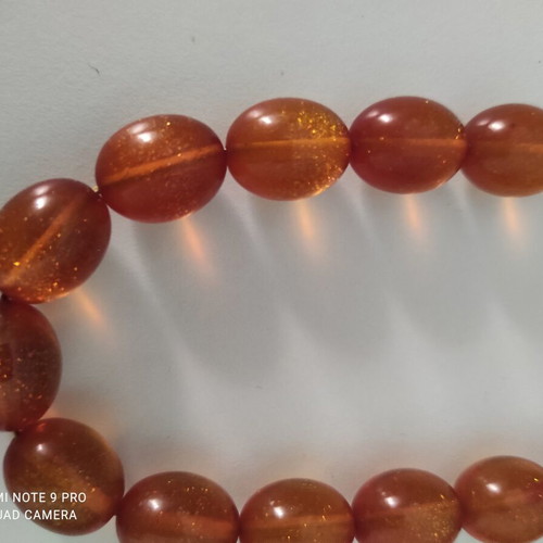 Mastic komboloi with orange shades, 33 beads