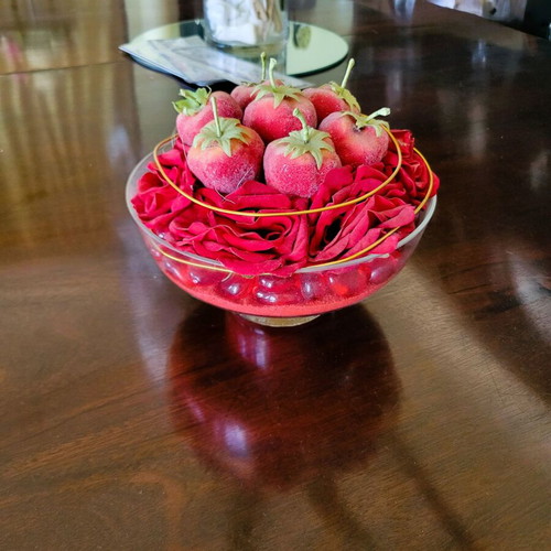 Decorative glass bowl centerpiece with red roses and velvet fruits like new