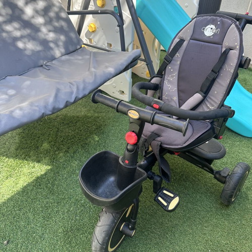 Byox tricycle like new with sunshade and foldable design