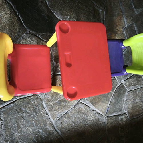 Children's table with two plastic chairs used