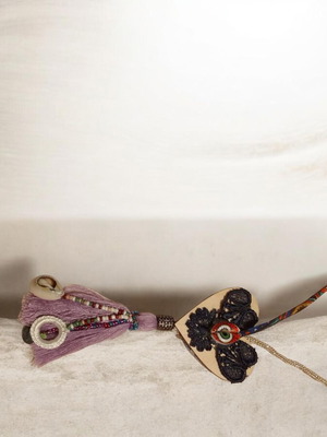 Handmade necklace with wooden heart and colorful designs