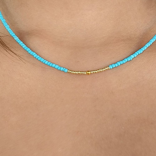 Handmade necklace with gold and blue beads
