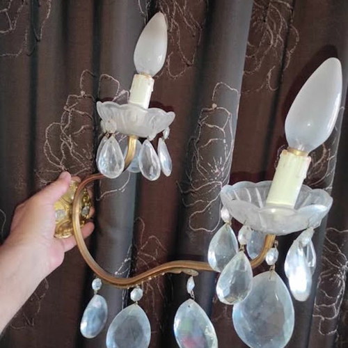 Vintage brass two-light wall sconces used with crystals