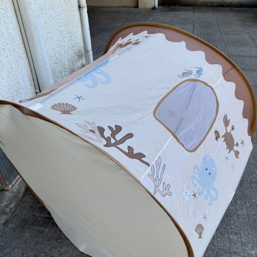 Children's play tent with ocean-themed design