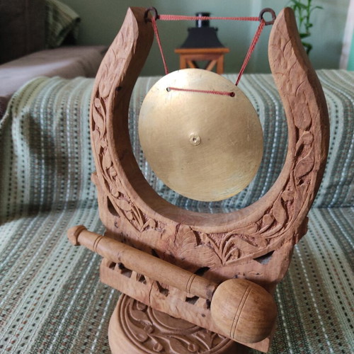 Handmade wooden gong musical instrument with bronze plate