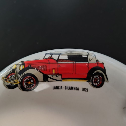 Ceramic ashtray used with vintage car designs
