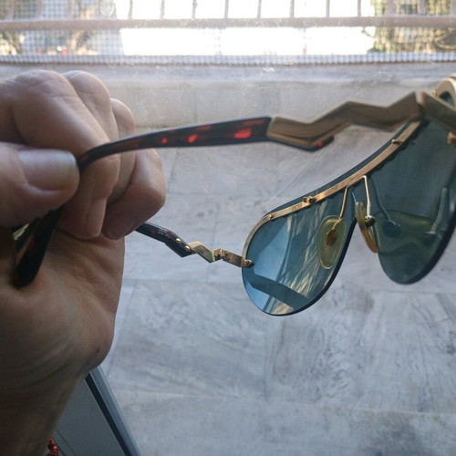 Paloma Picasso sunglasses used, black and gold