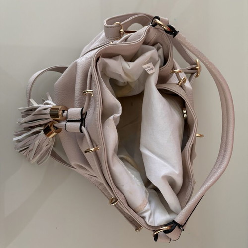 Nolah shoulder bag like new, nude color with tassels