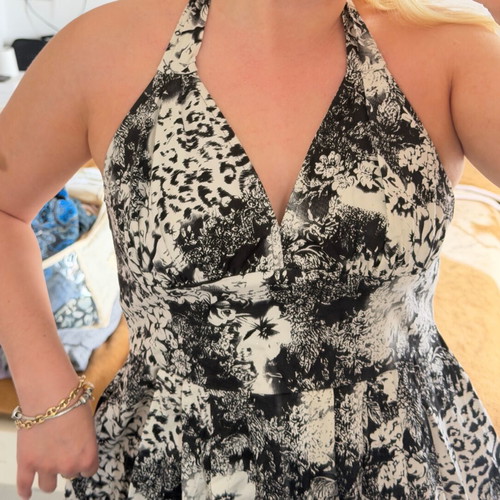 Vintage women's midi dress with halter neckline and black and white floral pattern used