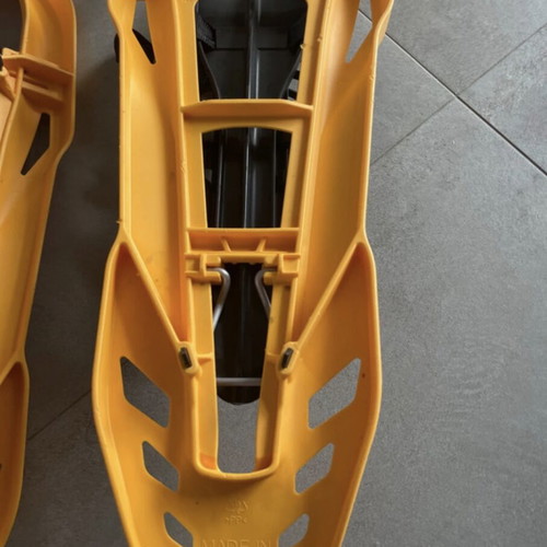 Sneka snowshoes used for hiking with metal crampons