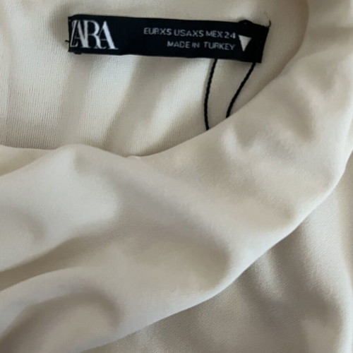 Zara cream mini dress like new, fitted with side and back ruching
