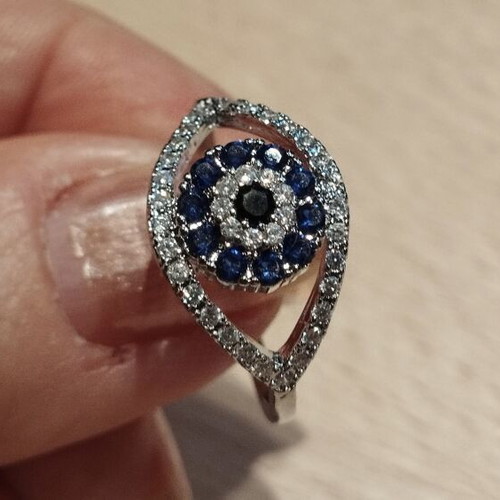 Luxury ring with blue and zircon stones, like new
